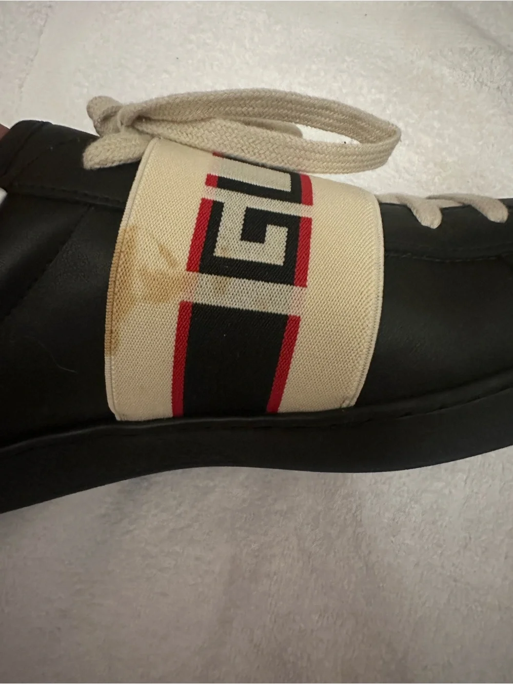 Gucci Black Leather Sneakers with Cream Strap and Red Accent